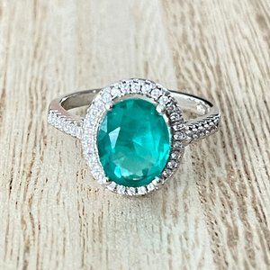 Oval Simulated Emerald Halo Ring - 925 Sterling Silver